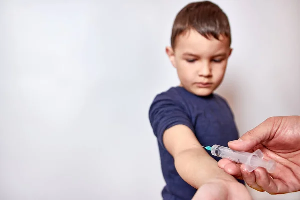 Try Giving Boy Injection Medicine Syringe Стоковая Картинка