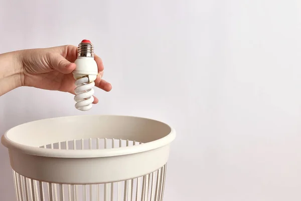 Person Throwing Away Light Bulb Trash Bin — Stock Fotó