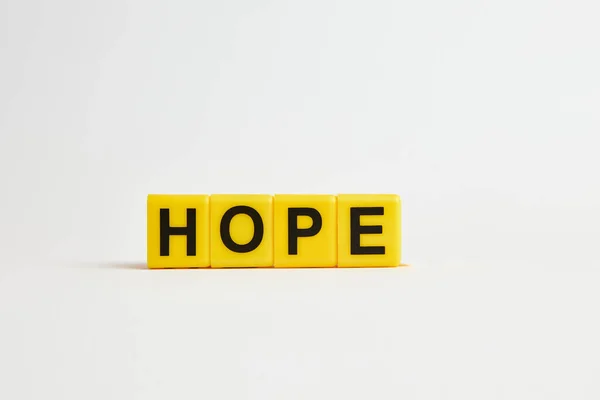 Hope Text Made Yellow Plastic Blocks White Background — Zdjęcie stockowe