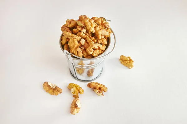 stock image Walnuts in a metal mini-bucket.