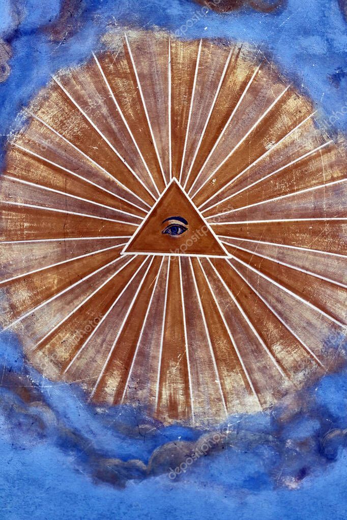 An all-seeing eye in the sky among the clouds.