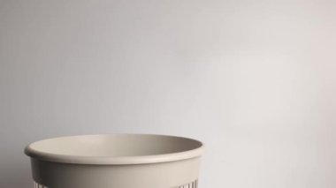 Cellulose napkins were thrown into the trash for disposal and recycling