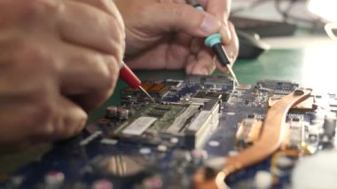 During repair of the motherboard, testing is carried out. Repair and maintenance of computers.