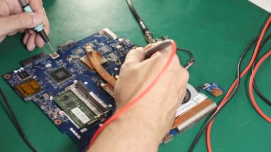 During repair of the motherboard, testing is carried out. Repair and maintenance of computers.