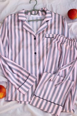 A beautiful stylish summer blouse on a hanger