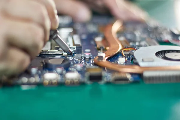 During repair of the motherboard, testing is carried out. Repair and maintenance of computers.