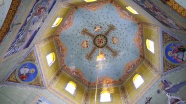 Interior, architecture of the Orthodox church with painting and iconostasis.