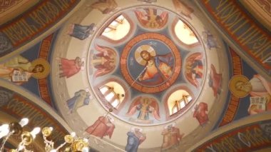 Interior, architecture of the Orthodox church with painting and iconostasis.