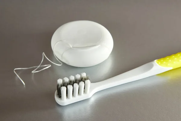 Dental Floss Toothbrush Gray Background Dental Care — Stock Photo, Image