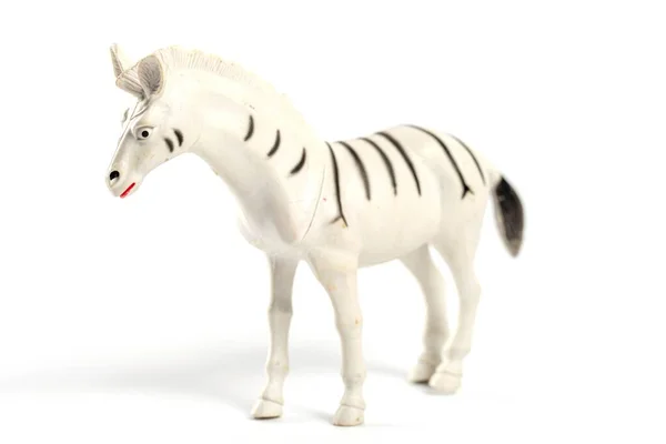 おもちゃ動物ゼブラ上の白い背景 — ストック写真