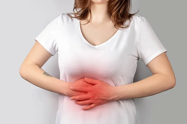 Woman Experiencing Abdominal Pain Treatment Prevention Conc — Stockfoto