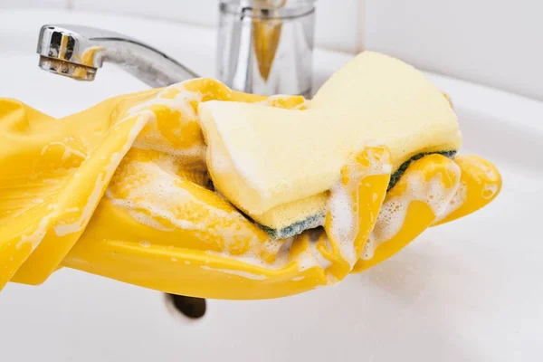 Hand Yellow Rubber Gloves Holds Foamy Sponge — Stock Fotó