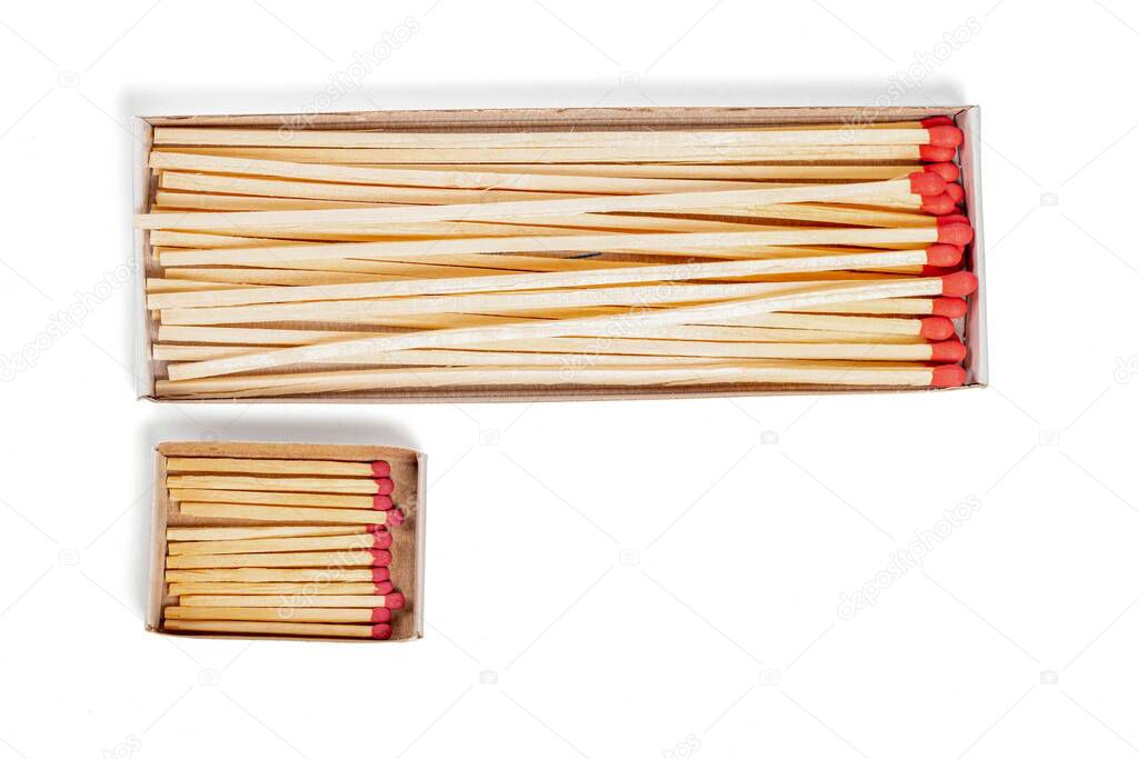 Packages with mantel long and short matches on white, top view