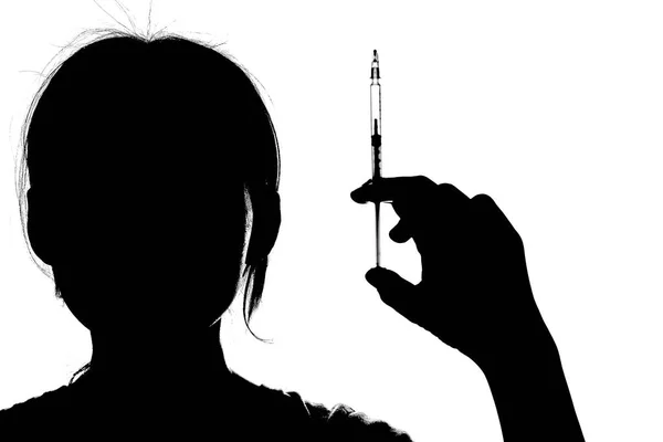 Female Doctor Silhouette Holding Syringe Vaccine — Stock Photo, Image