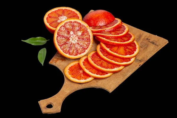 Sliced Ripe Sicilian Red Orange Board Black Background — Fotografia de Stock