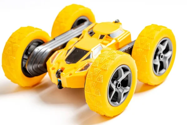 Yellow toy radio-controlled car-shifter, close-up