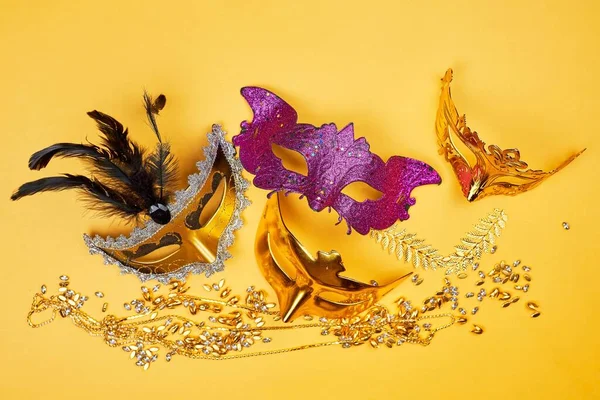 Colorful Mardi Gras Masks Yellow Background — Stockfoto