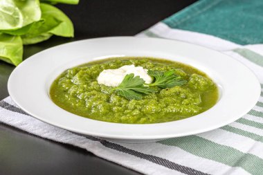 Dietary green cream soup, close up