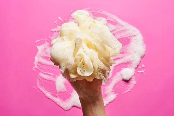 Hand Female Holds Skin Sponge Foam Pink Backgroun — Foto Stock