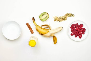 Preparing dieting milkshake with tropical fruits
