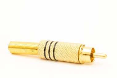 Golden RCA connector for audio cable isolated above white backgr