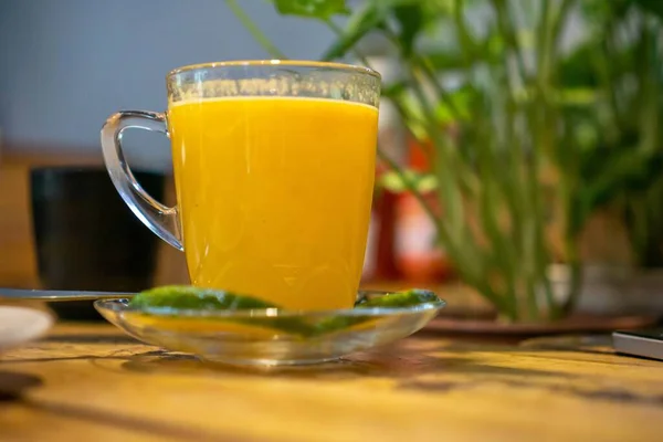 Hot Orange Tea Cinammon Glass Cup Plants — Stock Photo, Image