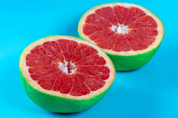 Grapefruit Halves Pastel Blue Background Summer Concept — Fotografia de Stock