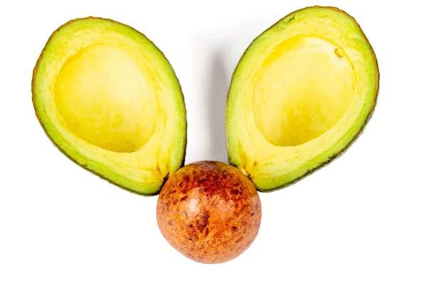 Draufsicht Samen Und Zwei Hälften Reife Avocado — Stockfoto