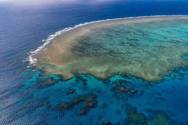 Great Barrier Reef - aerial view of the coral reef with the sea and the ocean