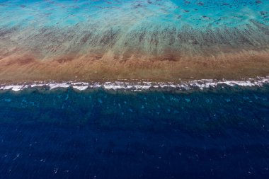 Great Barrier Reef - aerial view of the coral reef with the sea and the ocean