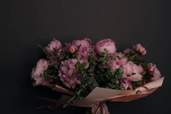 BOUQUET OF FLOWERS. PINK POENIES. PHOTO SHOOT.