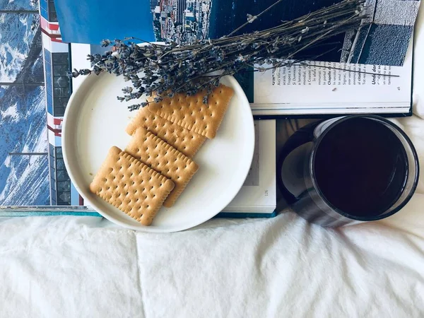LIFESTYLE. AESTHETIC PICTURE. TRAVEL MOOD. LAVENDER. BOOK OF HOLIDAY DESTINATIONS. LAVENDER. SOMETHING TO DRINK. BISCUITS WITH BUTTER. RELAXATION.