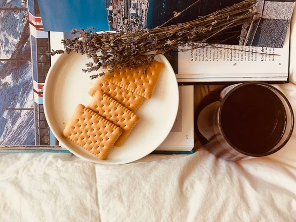 LIFESTYLE. AESTHETIC PICTURE. TRAVEL MOOD. LAVENDER. BOOK OF HOLIDAY DESTINATIONS. LAVENDER. SOMETHING TO DRINK. BISCUITS WITH BUTTER. RELAXATION.
