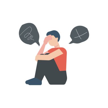 The boy is sitting worried.