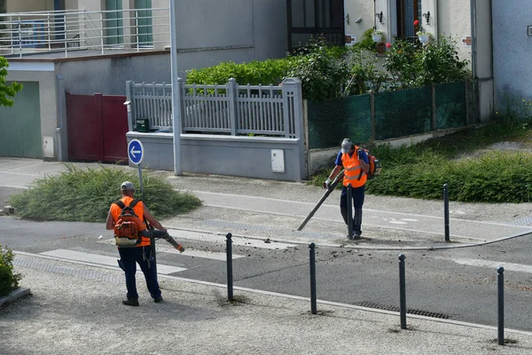 city street cleanliness maintenance worker