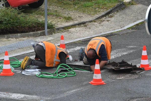 street sewer cleaning workers