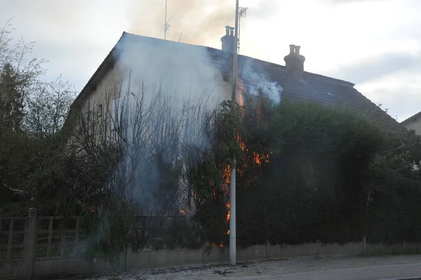 start of fire in a dwelling house