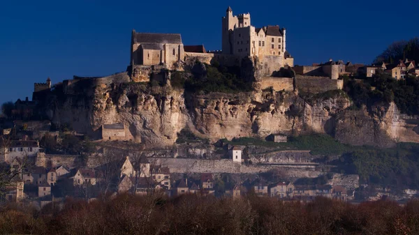 Close shot of the castle of Beynac at morning time, the castle is built on a cliff