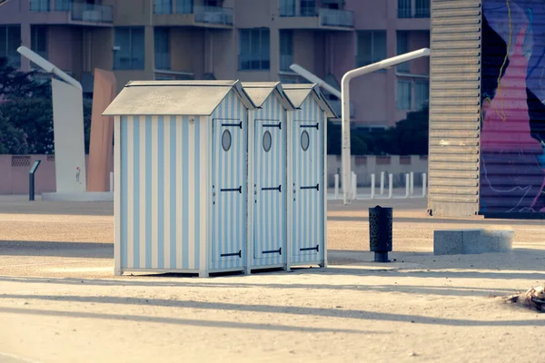 Typical beach cabins with striped paint at Barcars, France
