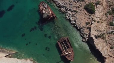 Aerial top shot view of famous shipwreck in Liverio bay near Kalotaritissa village, Cyclades islands, Greece