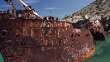 Aerial drone video of famous shipwreck of Olympia abandoned in Liverio bay near Kalotaritissa village, Cyclades islands, Greece