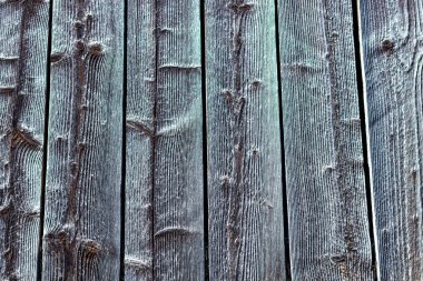 Çeşitli ahşap yüzey. Evlerin duvarları ahşaptan yapılmıştır. Arkaplan ve inşaat tahtaları. Ukrayna köylerindeki kütük evi.