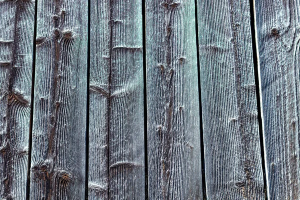 Çeşitli ahşap yüzey. Evlerin duvarları ahşaptan yapılmıştır. Arkaplan ve inşaat tahtaları. Ukrayna köylerindeki kütük evi.