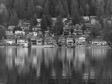 Waterfront houses reflected in the water