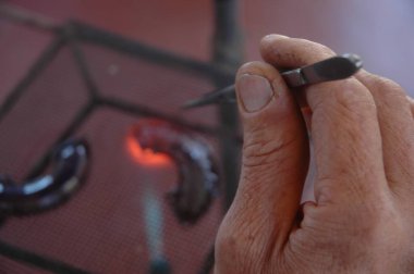 Hands of artisans from the north of Argentina