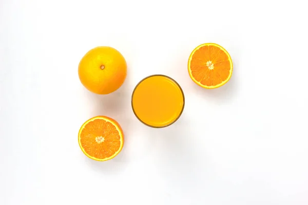 Two Pieces Juicy Oranges Glass Orange Isolated White Background Center — стоковое фото