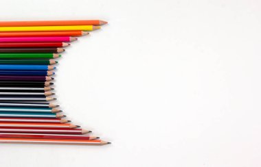 Color pencils on white backgroup. used in Back to school concept for Modern design. Top view of multi color pencils isolated on white background