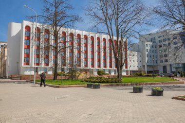 Minsk, Belarussia. City infrastructure, street with buildings, transport and people.26.04.2022
