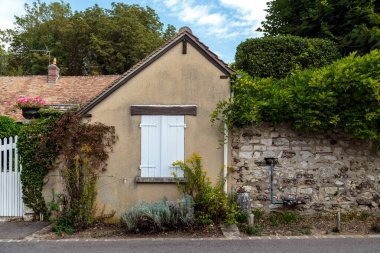 GIVERNY, FRANCE - AUGUST 31, 2019: This is a fragment of one of the picturesque houses in the famous Impressionist village.