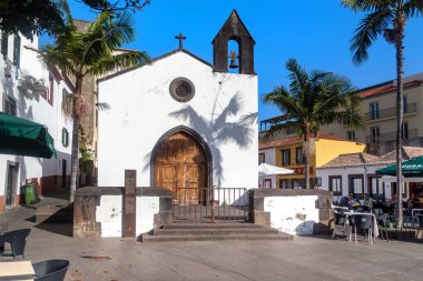 FUNCHAL, PORTUGAL - AUGURS 20, 2021: The Chapel do Corpo Santo (15th century) is one of the oldest religious buildings on the island, located in the Zona Velha.